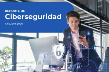 Ejecutivo frente a un computador con íconos de candado, reporte de ciberseguridad de Gtd sobre ransomware